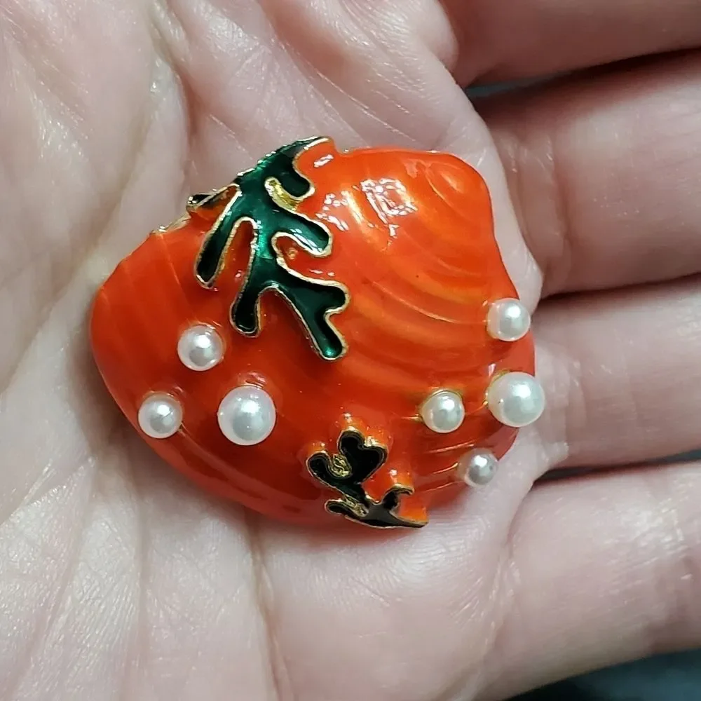 Gold tone orange enamel shell brooch faux pearl